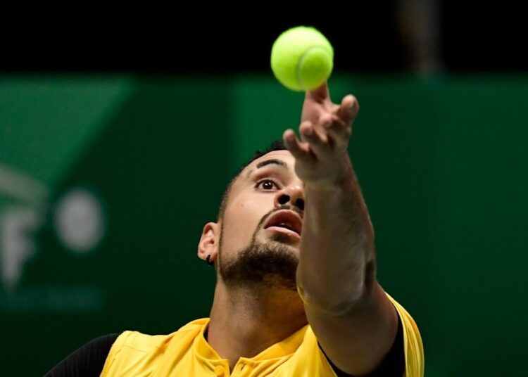 Australia's Nick Kyrgios serves to Belgium's Steve Darcis   during their singles tennis match at the Davis Cup Madrid Finals 2019 in Madrid on November 20, 2019. (Photo by JAVIER SORIANO / AFP)
