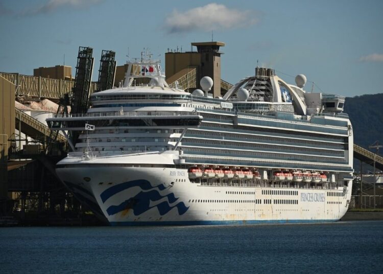 Cruise liner Ruby Princess sits in the harbour in Port Kembla, 80km south of Sydney after coming in to refuel and restock on April 6, 2020. (Photo by PETER PARKS / AFP)