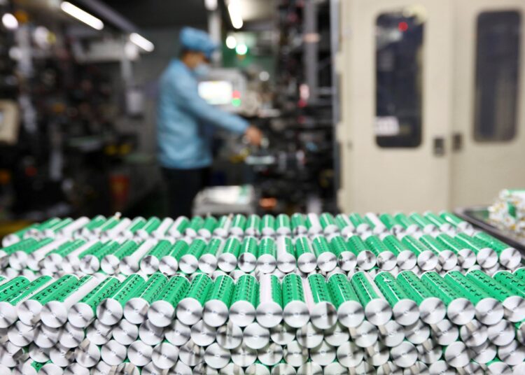 This photo taken on November 14, 2020 shows lithium batteries displayed in the workshop of a lithium battery manufacturing company in Huaibei, eastern China's Anhui province. (Photo by STR / AFP) / China OUT