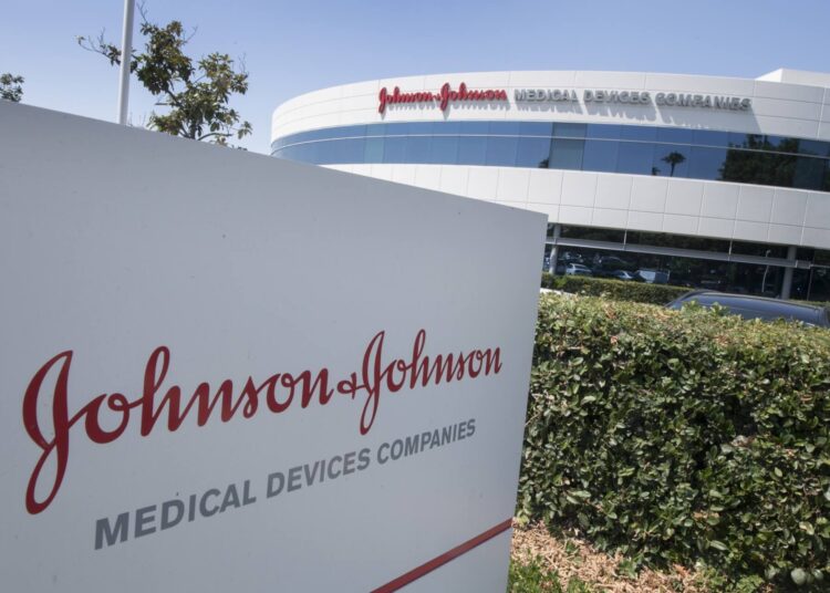 (FILES) In this file photo taken on August 28, 2019 an entry sign to the Johnson & Johnson campus shows their logo in Irvine, California. - The US Food and Drug Administration (FDA) on February 27, 2021 issued emergency use authorization for the Johnson & Johnson Covid-19 vaccine. (Photo by Mark RALSTON / AFP)