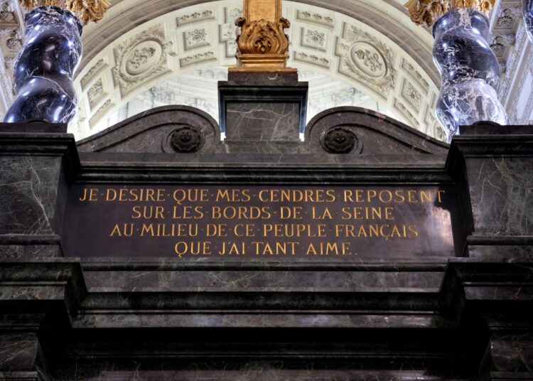 (FILES) A picture taken on April 7, 2021, shows the monument leading to the crypt where the body of late French Emperor Napoleon I rests, with an inscription reading "I want my ashes to rest on the banks of the river Seine among the French people that I loved so much", under the dome of the Hotel des Invalides, in Paris. - The 200th anniversary of Napoleon Bonaparte's death will be marked on May 5, 2021. (Photo by THOMAS COEX / AFP)