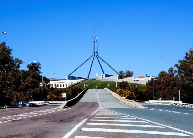 A general view of the empty roads around the Parliament House building on the first day of the seven-day lockdown in Canberra on August, 13, 2021. (Photo by Jamila Toderas / AFP)