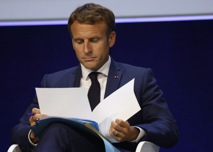 French President Emmanuel Macron gets ready to deliver a speech during the IUCN World Conservation Congress on September 3, 2021, in Marseille, southern France. - The IUCN World Congress will drive action on nature-based recovery, climate change and biodiversity. (Photo by Ludovic MARIN / AFP)