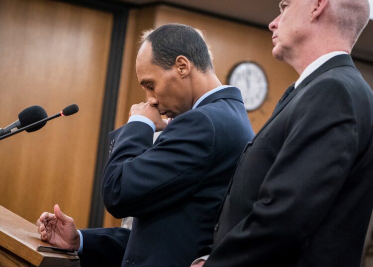 (FILES) In this file photo taken on June 07, 2019, former Minneapolis police officer Mohamed Noor reads a statement before being sentenced by Judge Kathryn Quaintance in the fatal shooting of Justine Ruszczyk Damond at the Hennepin County District Court in Minneapolis, Minnesota. - Noor, 36, was sentenced to 57 months in prison on October 21, 2020, for the fatal shooting of an Australian Justine Ruszczyk Damond, who had called 911 to report a crime. Noor was convicted in 2019 of third-degree murder and second-degree manslaughter in the 2017 death of Damond in a case that shocked this Minnesota city and sparked outrage in the victim's home country. (Photo by Leila Navidi / POOL / AFP)