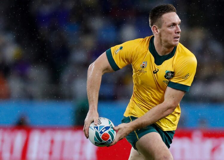 (FILES) A file photo taken on October 11, 2019 shows Australia's wing Dane Haylett-Petty in action during the Japan 2019 Rugby World Cup Pool D match between Australia and Georgia at the Shizuoka Stadium Ecopa in Shizuoka. - Wallabies fullback Dane Haylett-Petty has retired from rugby union after a year-long battle with the lingering effects of concussion, saying doctors had advised him to "listen to your head". (Photo by Adrian DENNIS / AFP) / NO USE AFTER NOVEMBER 18, 2021 02:29:42 GMT
