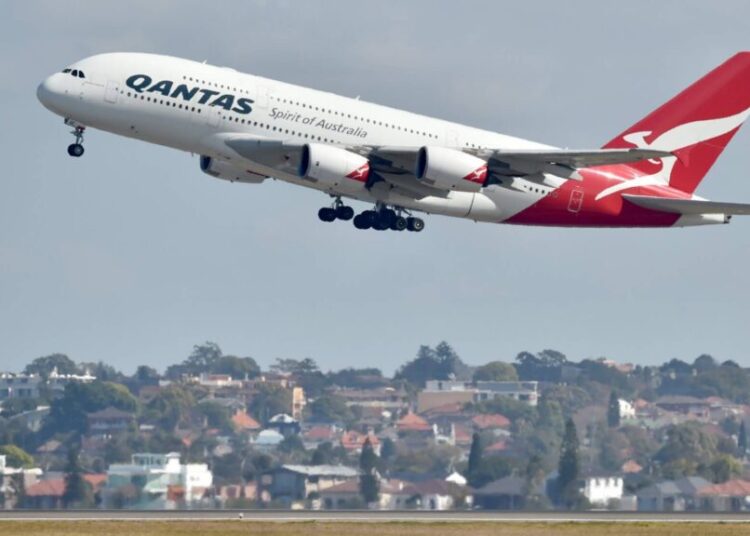 A Qantas Airbus A380 takes off from the airport in Sydney on August 25, 2017. - Australia's Qantas unveiled plans for the world's longest non-stop commercial flight on August 25, 2017 calling it the "last frontier of global aviation", as it posted healthy annual net profits on the back of a strong domestic market. (Photo by PETER PARKS / AFP)