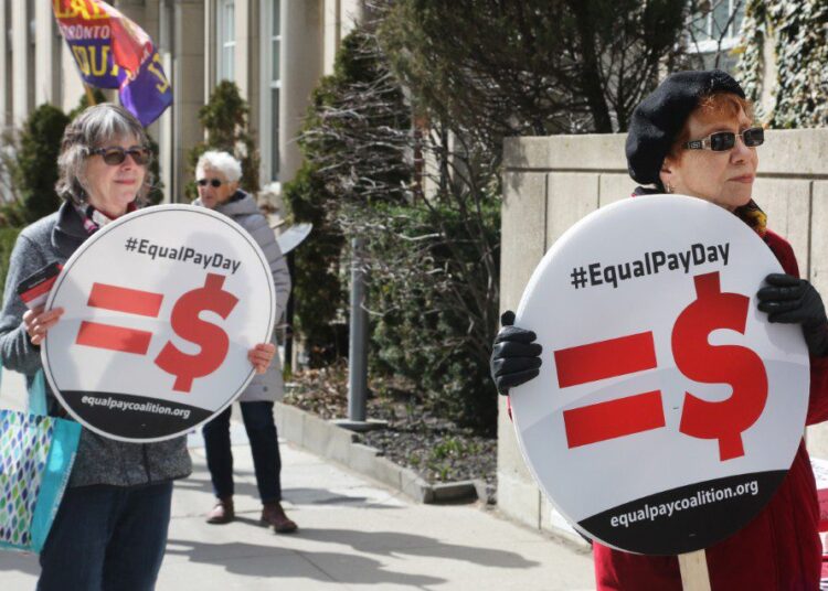 Women rally outside the Ontario Ministry of Labour building to demand equal pay for women and an end to the wage gap between the sexes on 'Equal Pay Day' in Toronto, Ontario, Canada, on April 09, 2019. The annual event recognizes the wage gap between the sexes in a country where women's salaries still lag behind that of men for equivalent jobs across the employment spectrum. (Photo by Creative Touch Imaging Ltd./NurPhoto) (Photo by Creative Touch Imaging Ltd / NurPhoto)