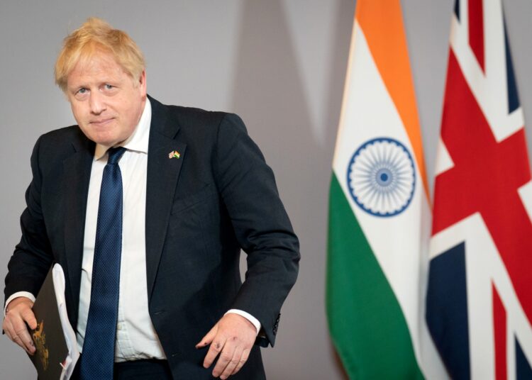 Britains Prime Minister Boris Johnson attends a press conference in New Delhi on April 22, 2022. (Photo by Stefan Rousseau / POOL / AFP)