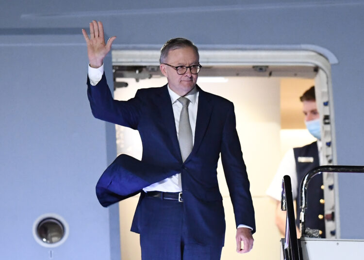 Australia's Prime Minister Anthony Albanese arrives at Haneda airport in Tokyo on May 23, 2022, for a summit with the US, Japanese and Indian leaders, known as the Quad. (Photo by CHARLY TRIBALLEAU / AFP)
