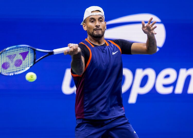 Australia's Nick Kyrgios hits a return to Russia's Daniil Medvedev during their 2022 US Open Tennis tournament men's singles Round of 16 match at the USTA Billie Jean King National Tennis Center in New York, on September 4, 2022. (Photo by COREY SIPKIN / AFP)