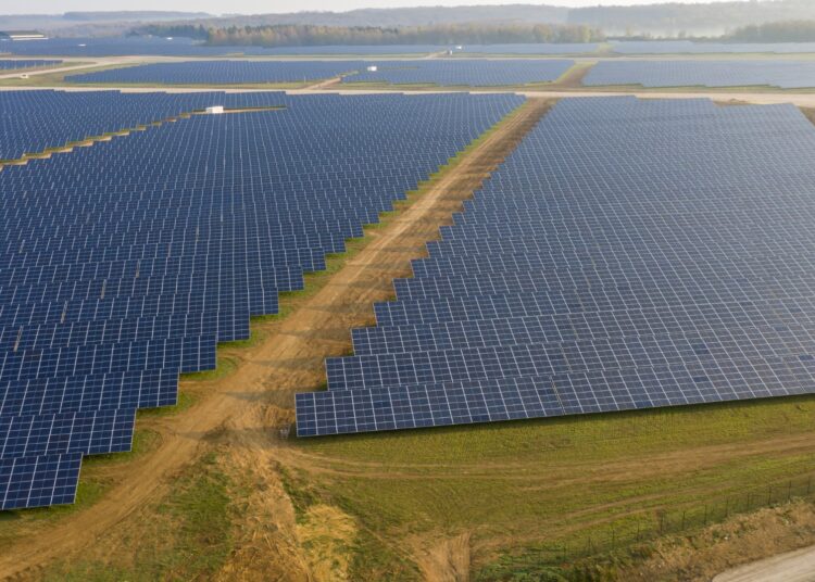 (FILES) In this file photo taken on September 14, 2017 This aerial picture taken on April 20, 2021, shows a photovoltaic power station on the former Marville-Montmedy airbase in Marville, eastern France, on April 20, 2021. - With an area of 178 ha and 364,000 photovoltaic panels, this will be the second largest solar park in France. (Photo by JEAN-CHRISTOPHE VERHAEGEN / AFP)