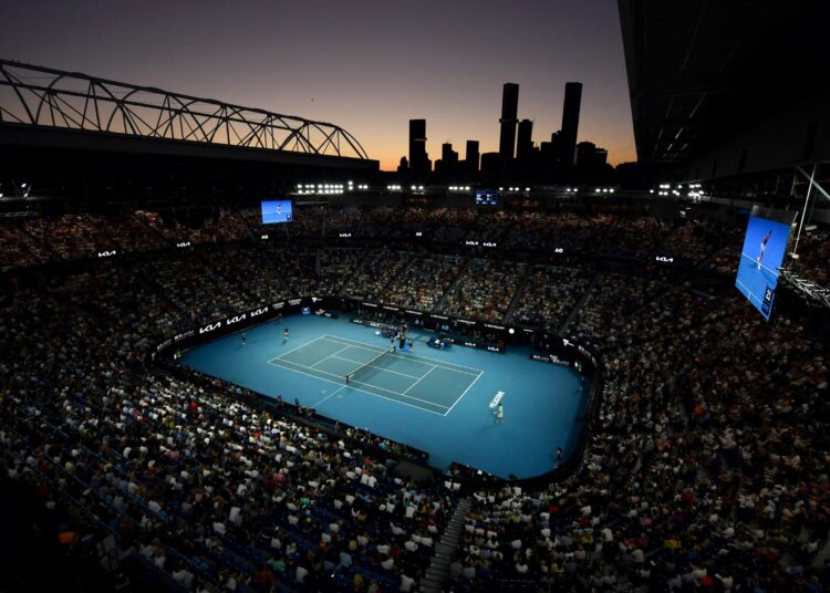 (files) A file photo taken on January 30, 2022 shows a general view of Rod Laver Arena during the men's singles final match between Spain's Rafael Nadal and Russia's Daniil Medvedev at the Australian Open tennis tournament in Melbourne. - Australia will over the next decade host a bumper schedule of major international sporting events as part of a long-term plan to boost tourism, health and the economy while also enhancing its global image. (Photo by PAUL CROCK / AFP) / TO ACCOMPANY FOCUS PIECE BY MARTIN PARRY. SPORT-AUS-HEALTH-ECONOMY - TO ACCOMPANY FOCUS PIECE BY MARTIN PARRY. SPORT-AUS-HEALTH-ECONOMY