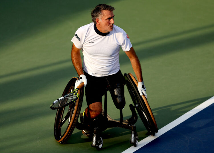 NEW YORK, NEW YORK - SEPTEMBER 05: Stephane Houdet of France looks on against Tokito Oda of Japan during their Men's Wheelchair Singles First Round match on Day Nine of the 2023 US Open at the USTA Billie Jean King National Tennis Center on September 05, 2023 in the Flushing neighborhood of the Queens borough of New York City.   Matthew Stockman/Getty Images/AFP (Photo by MATTHEW STOCKMAN / GETTY IMAGES NORTH AMERICA / Getty Images via AFP)